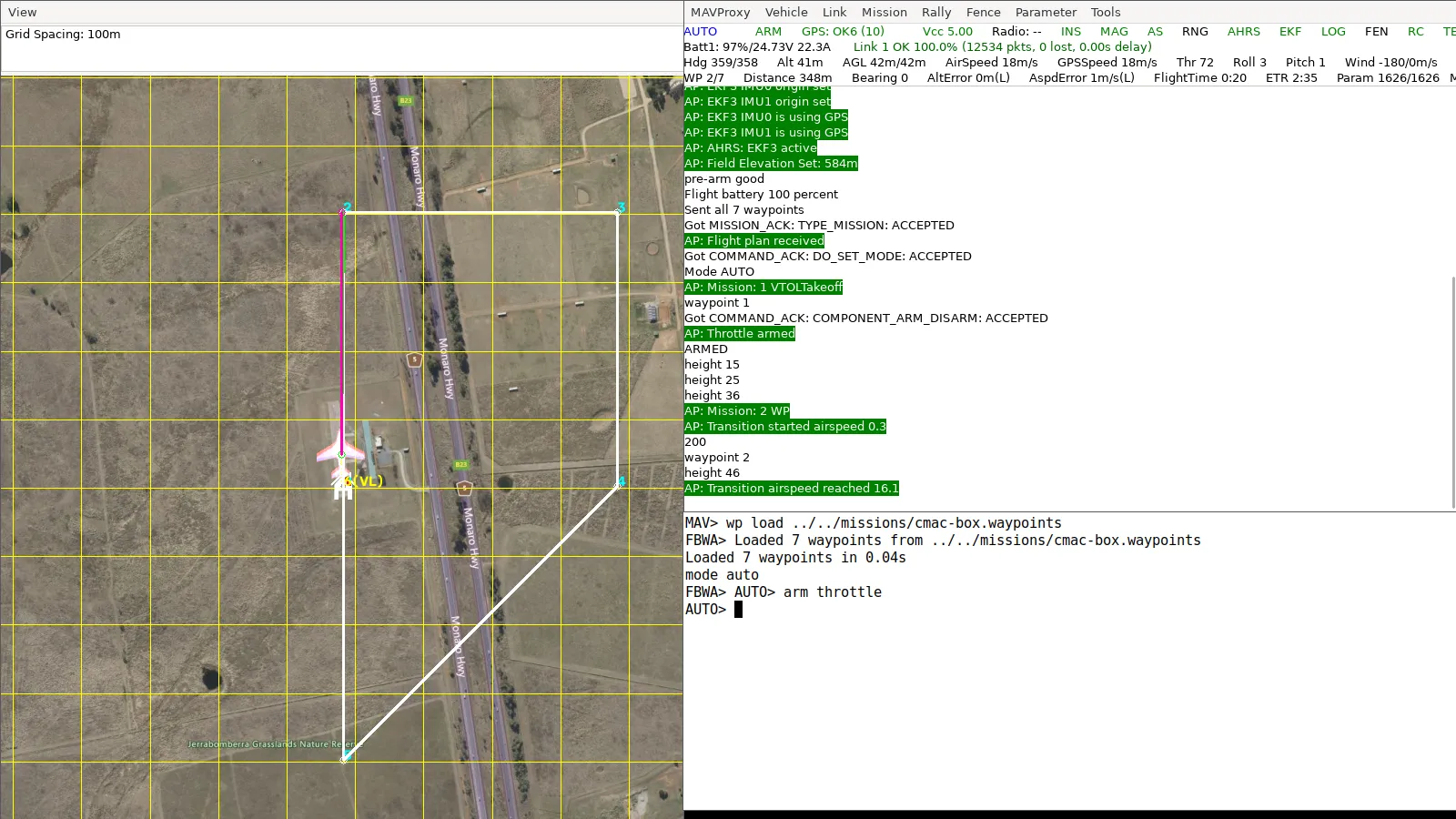 AUTO mission at the transition: the aircraft climbing out of its VTOL takeoff toward waypoint 2 at 18 m/s and 22 A, with Transition airspeed reached in the console
